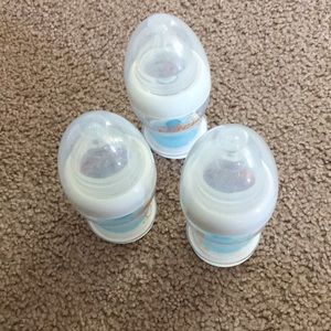 3 munchkin latch & 2 Nuby bottles